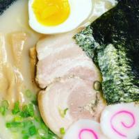 Miso Ramen · Ramen noodles, pork charsu, naruto (fish cake), soft boil egg, mushrooms, green onion, and d...