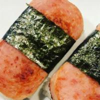 Spam Musubi · Marinated  Spam with rice wrapped in Seaweed.