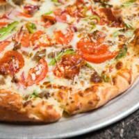 Grecian Delight Pizza · Pesto, mozzarella, feta, gyro, pepperoni, onions, tomatoes, green peppers.