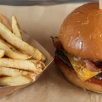 Farm Burger · Applewood smoked bacon, fried egg, ketchup and melted American cheese. Served with French Fr...
