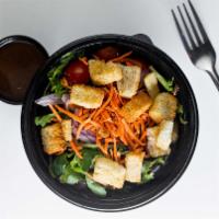 House Salad · Organic greens, tomatoes, carrots, onions and croutons with choice of dressing.