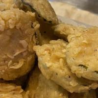 Fried Pickles · Crispy Fried Dill Pickles served with Ranch. Please indicate if you want to substitute vegan...