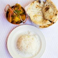 Aloo Gobi · Potatoes & cauliflower cooked with special spices. Served with rice.