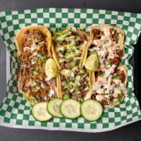 4 Tacos (Street Tacos) · Street taco topping with cilantro, onion and cabbage.
Marinated chicken comes with cabbage a...