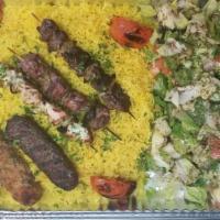 King Family Combo · 4 Skewers (chicken, beef, ground chicken, and kafta) served with hummus, rice, salad, and th...