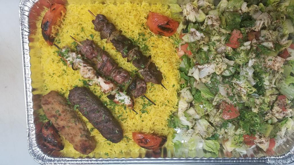 King Family Combo · 4 Skewers (chicken, beef, ground chicken, and kafta) served with hummus, rice, salad, and three pita bread.