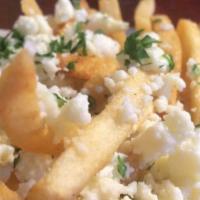 Greek Fries · French fries with feta cheese and parsley.