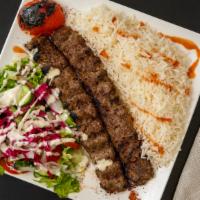 Kebob Plate · Two skewers of your choice of meat(beef,lamb or kafta served with hummus, rice, and salad wi...