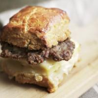 Sausage Breakfast Biscuit · Housemade pork sausage, scrambled egg and Beecher’s Flagship cheese on our housemade biscuit.