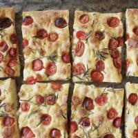 Savory Focaccia · This focaccia is inspired by one you'd find in Italy with an airy texture and dimples. We to...