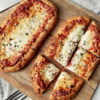 Rustic Ready-To-Bake Pizza · Not your typical frozen pizza! The crisp and flavorful crust is formed form our Giuseppe dou...