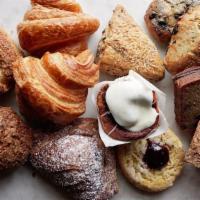 Dozen Assorted Pastries · An assortment of pastries currently available in the cafe. Please note a preference for nuts.