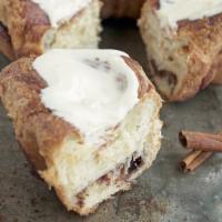 Cinnamon Roll · Our cornetto dough rolled with cinnamon, brown sugar and butter, topped with cream cheese gl...