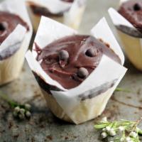 Mini Buttermilk Chocolate Cup · Buttermilk cake with milk chocolate frosting, garnished with chocolate pearls.