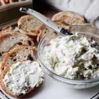 Roasted Artichoke Spread · Cream cheese and feta with marinated artichoke hearts, lemon and a hint of chili flakes.