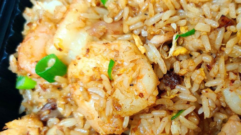 Fried Rice · Rice, eggs and green onion stir-fried with your choice of meat or vegetables.