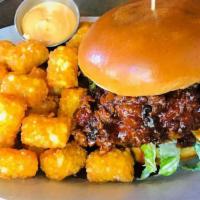 Nashville Honey Chicken · Buttermilk fried chicken tossed in a hot honey sauce & topped with shredded lettuce tossed i...