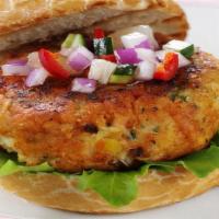 Jerk Salmon Burger · (GFO) Jerk seasoned salmon patty
With a lemon-dill aioli. Topped with
Watercress, tomato & o...