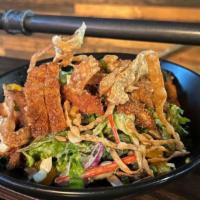 Chicken Katsu Salad · Asian style fried chicken served over mixed greens with red onion, bell pepper, mandarin ora...
