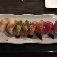 Rainbow Paradise · Five types of fish on a California roll.