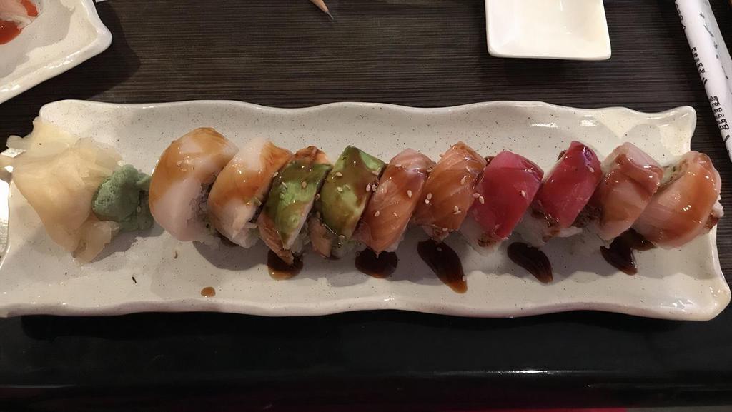 Rainbow Paradise · Five types of fish on a California roll.
