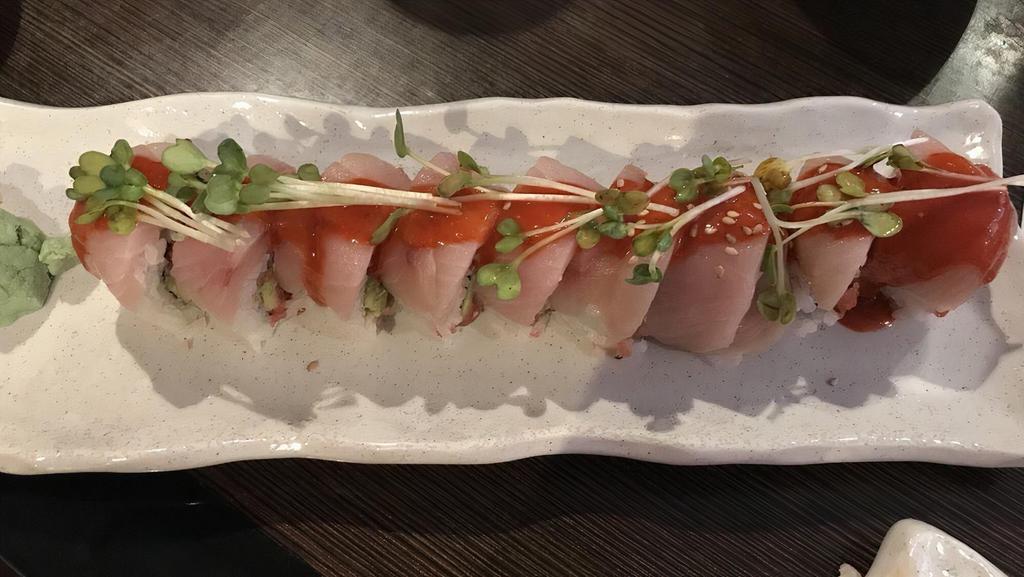 Cupid · Spicy. Hamachi covered with spicy tuna.