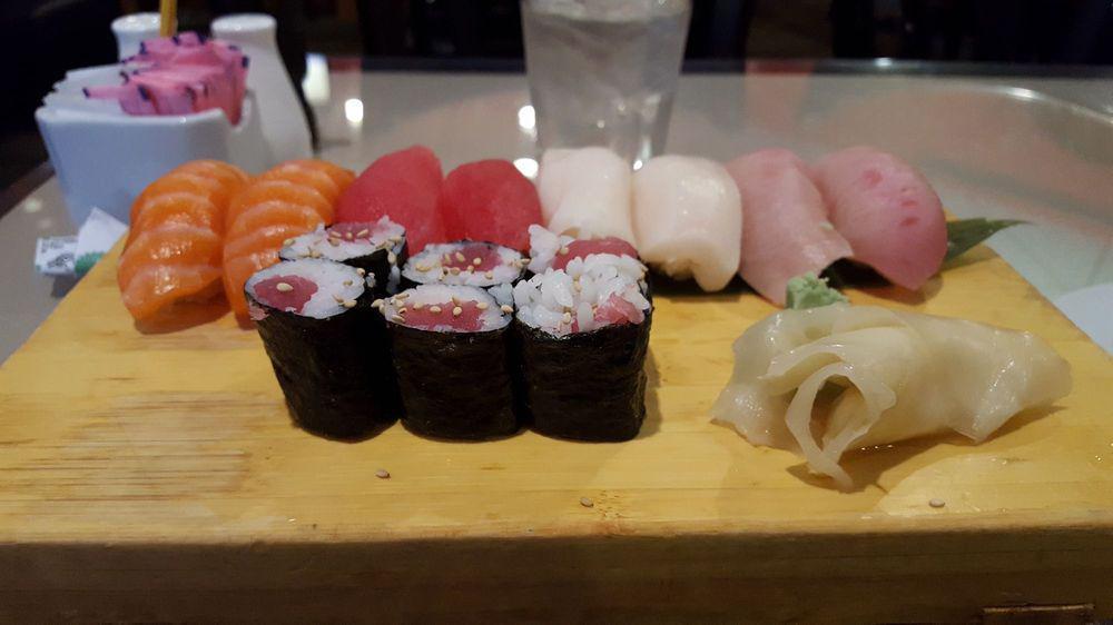 Sushi Entree · Eight pieces of chef's selection, tuna roll and soup.