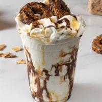 Coconut Dream Shake
 · Vanilla or chocolate ice cream, layered with fudge, coconut and carmel. Topped with carmel a...