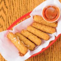 Fried Mozzarella Sticks · Deep-fried cheese sticks. Crispy on the outside, gooey on the inside. Served with a side of ...