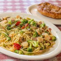 Spaghetti Primavera · Choice of chicken or shrimp with sauteed onions, mushrooms, broccoli, red and yellow peppers...