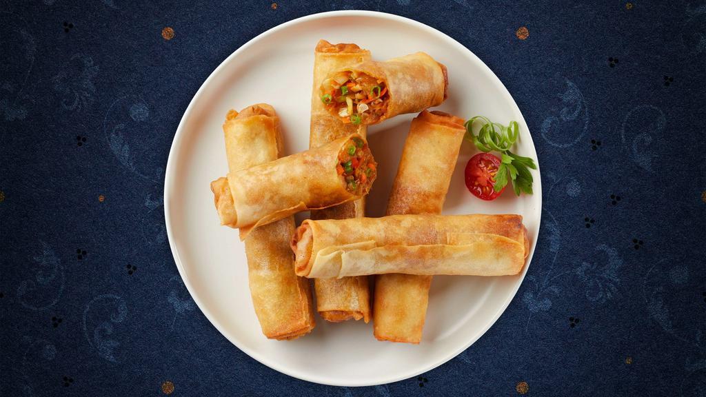 Veggie Egg Rolls · (4 Pieces) House-made vegetable egg roll stuffed with cabbage, carrots, and glass noodles, served with house-made sweet and sour sauce.