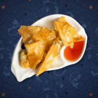 Crab Cheese Wonton · (5 Pieces) Golden fried wontons stuffed with real crabmeat and cream cheese filling, served ...