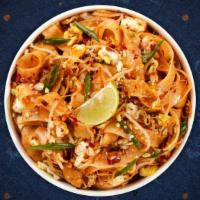 Pad Thai · Rice noodle in House Pad Thai sauce with bean sprouts and green onions topped with crushed p...