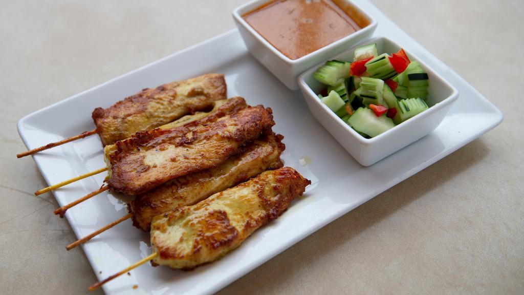 Chicken Satay (4Pc) · Grilled chicken skewered served with peanut and cucumber sauce.