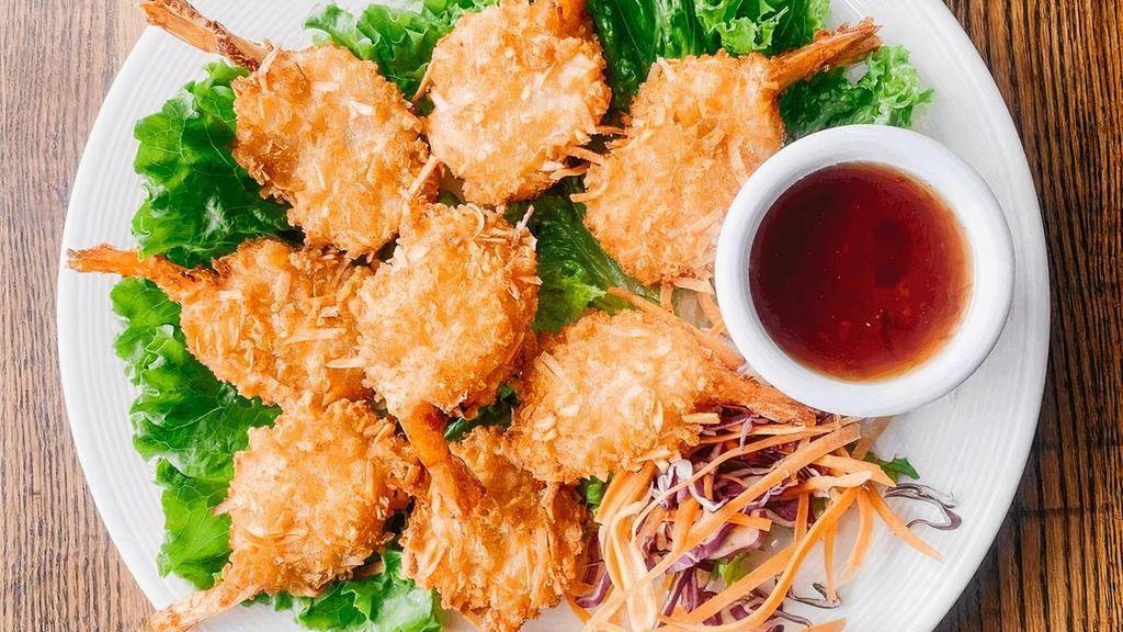 Coconut Prawns · Coconut battered prawns deep fried to golden brown, served with plum sauce