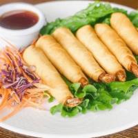 Prawn Rolls  · Coconut battered prawns deep fried to golden brown and served with plum sauce.