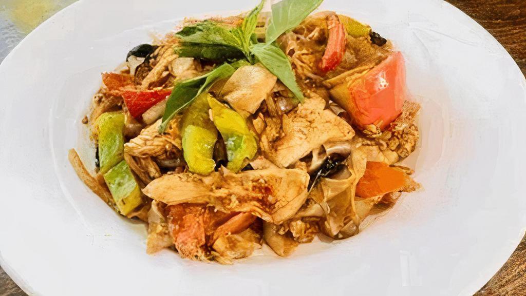 Phad Kee Mao · Wide rice noodles stir-fried in our special spicy sauce with bamboo shoots, tomatoes, onions, carrots, bell peppers, basil and egg (contains shrimp). Starts at 1 star.