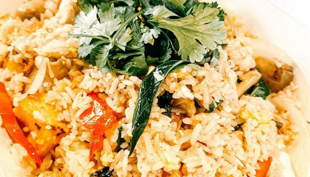 Basil Fried Rice · Stir-fried white jasmine rice with Thai basil, mushrooms, bell pepper, onions, and egg, in soy sauce and oyster sauce.