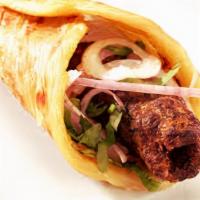 Kathi Roll  · Two seekh kabab served in a naan with lettuce, onions and cilantro.