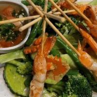 Grilled Prawns · Grilled Prawn Skewers, Steamed Broccoli, Green Beans, Carrots, Zucchini. Served with Spicy F...