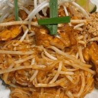 Pad Thai Jay · Stir-Fried Thin Rice Noodles with Fried Tofu, Chives, Turnip, Sprouts, and Ground Peanuts. N...
