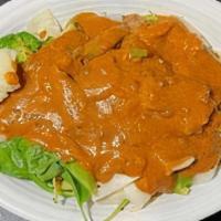 Rama Vegetables · Steamed Mixed Vegetables Topped with Peanut Sauce.