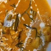 Panang Curry ** · Panang Curry Paste Cooked with Coconut Milk, Zucchini, Red Peppers, and Lime Leaves.