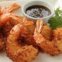 Coconut Prawns · Whole prawns tossed with coconut flake and deep-fried golden brown.