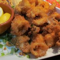 Calamari · Deep fried lightly breaded calamari.