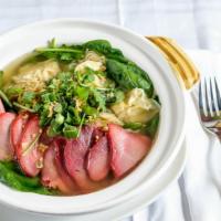 Wonton Soup · Fresh wonton stuffed with chicken in clear broth.