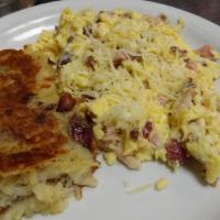 Build Your Own Scramble · A four egg scramble with your choice of three items. Served with potato cakes and your choic...