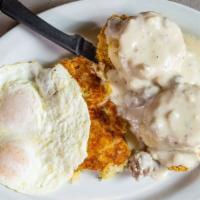 Chicken Fried Steak · Served with house-made sausage gravy, two eggs your way, potato cakes, and biscuits.