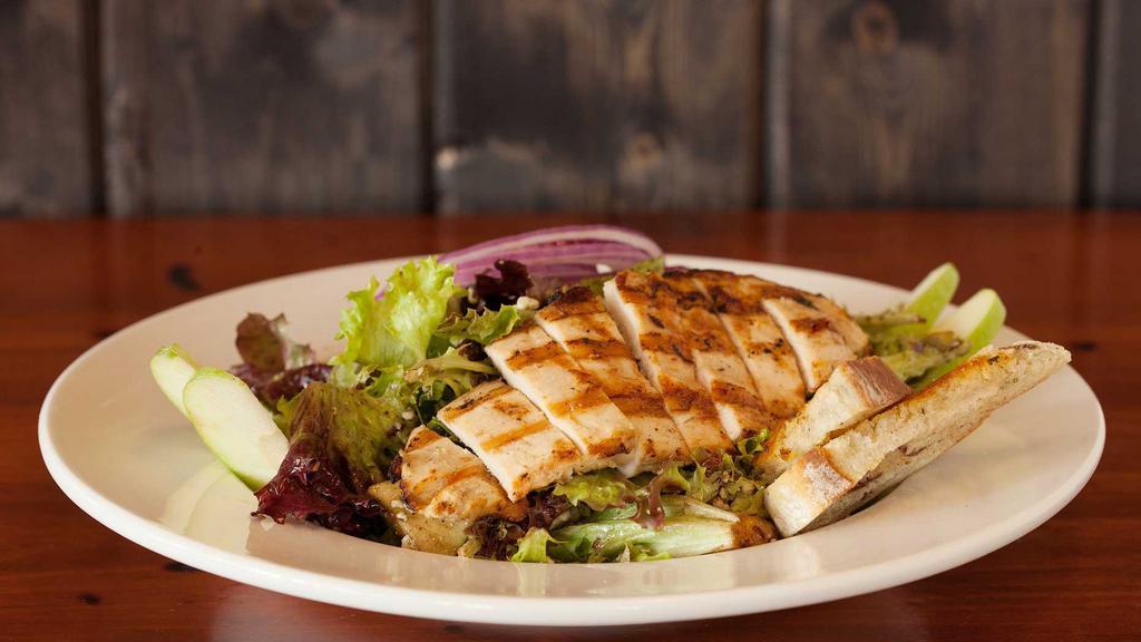 The Candied Pecan · Fresh cut apples, grilled chicken, bleu cheese crumbles, mixed greens, red onion, balsamic vinaigrette, with candied praline pecans.