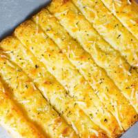 Garlic Breadsticks · With garlic butter, Italian seasoning and Parmesan cheese. Comes with marinara and garlic bu...